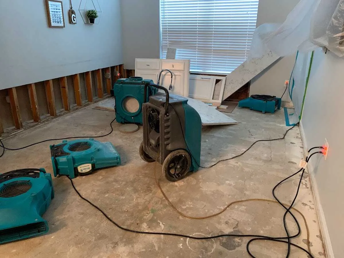 Dehumidifier in flood-cut room for Water Damage Restoration in Eastmont